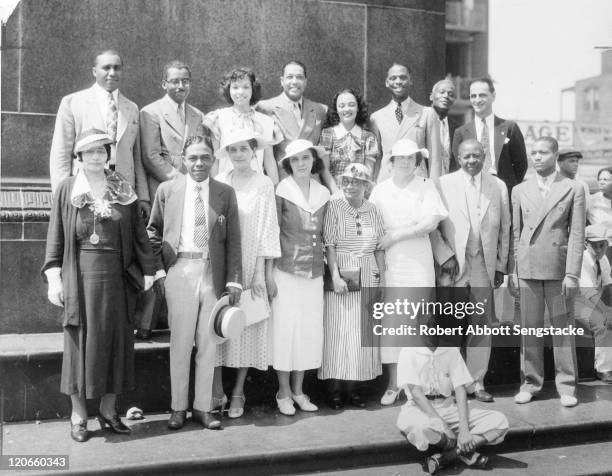 Group portrait of various dignitaries at the Bud Billiken parade, Chicago, Illinois, 1934. Among those pictured are the parade's founder, American...