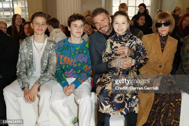 Romeo Beckham, Cruz Beckham, David Beckham, Harper Beckham and Anna Wintour attend the Victoria Beckham show during London Fashion Week February 2020...