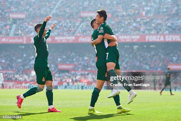 Wu Lei of RCD Espanyol celebrates scoring his team's second goal with team mates during the Liga match between Sevilla FC and RCD Espanyol at Estadio...