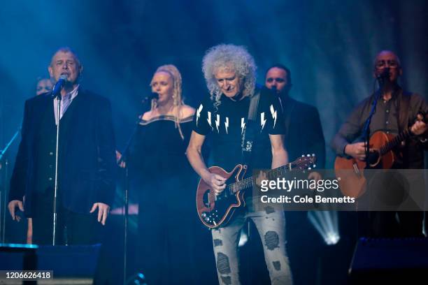 John Farnham and Brian May of Queen perform during Fire Fight Australia at ANZ Stadium on February 16, 2020 in Sydney, Australia.