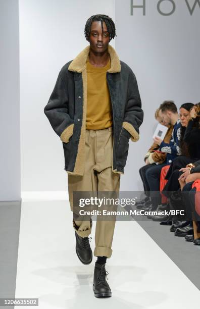 Model walks the runway at the Margaret Howell show during London Fashion Week February 2020 on February 16, 2020 in London, England.