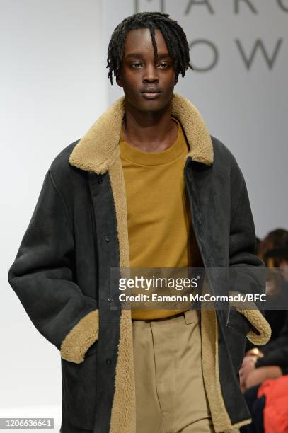 Model walks the runway at the Margaret Howell show during London Fashion Week February 2020 on February 16, 2020 in London, England.