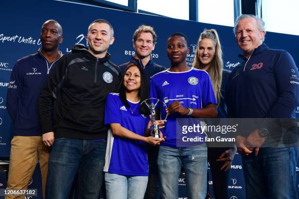 Co-founder and Executive Director Andrew So, Maria Martinez,Mohamed Konate from South Bronx United winners of the Laureus Sport For Good Award pose...