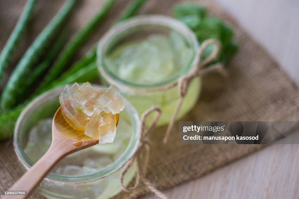 Close-Up Of aloe vera on wooden table.