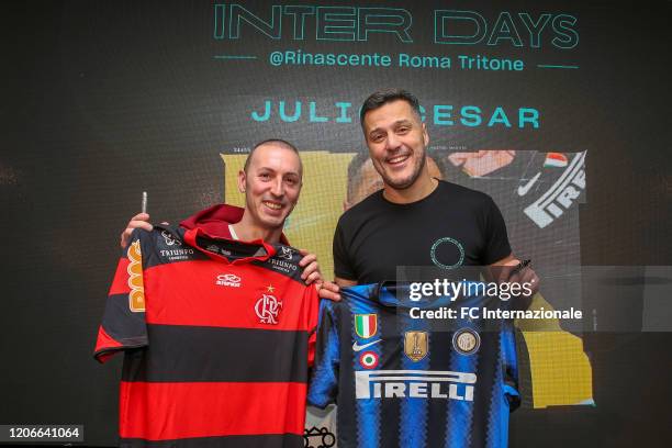 Brazilian former FC Internazionale goalkeeper Julio Cesar poses with a supporter during the FC Internazionale Vip Activities event at the Rinascente...