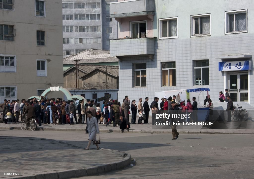 Line To Get Food In Pyongyang, North Korea On April 25, 2010 -