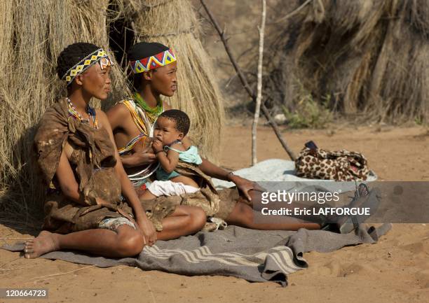 San Woman Breast Feeding Her Baby in Namibia on August 22, 2010 - San are an ethnic group of South West Africa. They live in the Kalahari Desert...