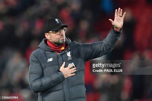 Liverpool's German manager Jurgen Klopp reacts at the final whistle during the UEFA Champions league Round of 16 second leg football match between...