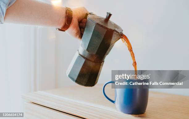 stove top coffee pot - blue cup stock pictures, royalty-free photos & images