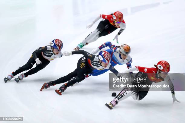 Ji Yoo Kim of South Korea competes and wins the Womens 1000m Final followed by Han Yutong of China and Sofia Prosvirnova of Russia in third during...
