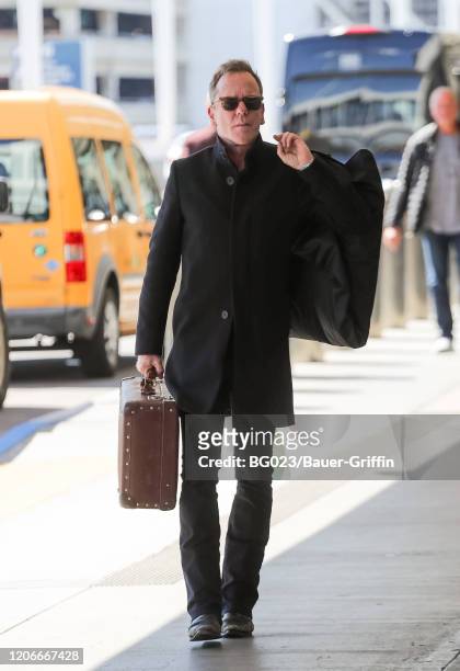 Kiefer Sutherland is seen at LAX on March 11, 2020 in Los Angeles, California.