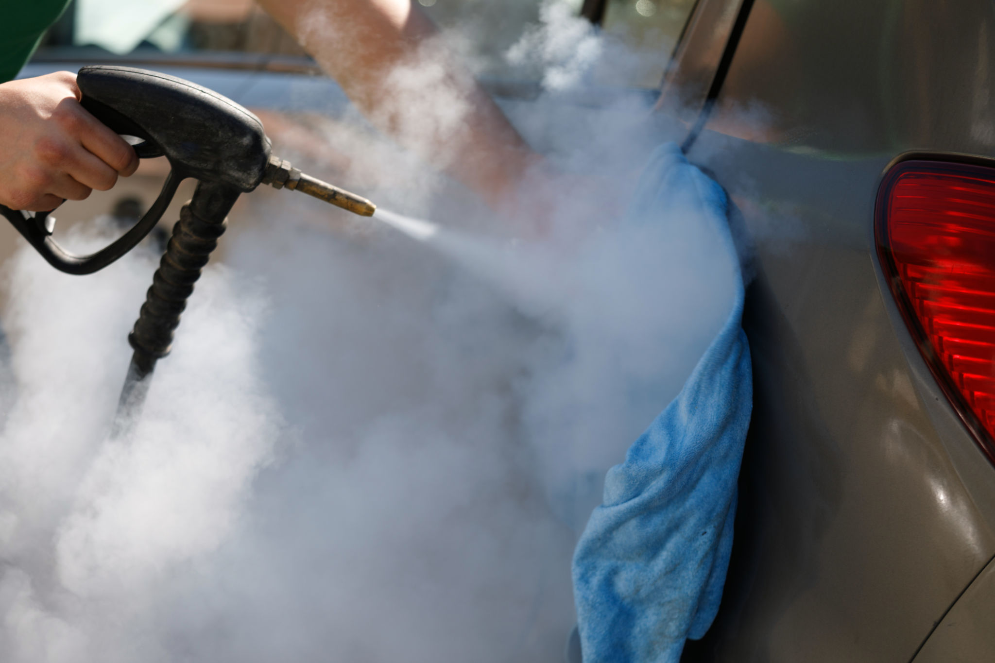 steam cleaning car
