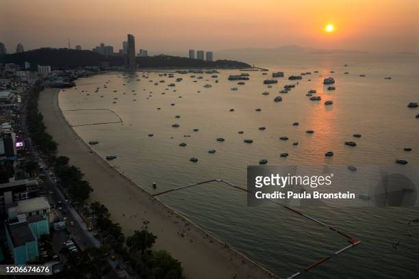 Scenes from above showing a quiet Pattaya beach normally packed with tourists in Pattaya, Thailand on March 11, 2020. Thailand depends on tourism,...