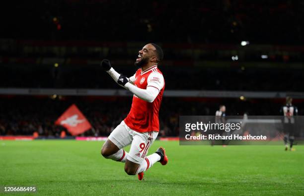 Alexandre Lacazette of Arsenal celebrates after scoring his sides fourth goal during the Premier League match between Arsenal FC and Newcastle United...