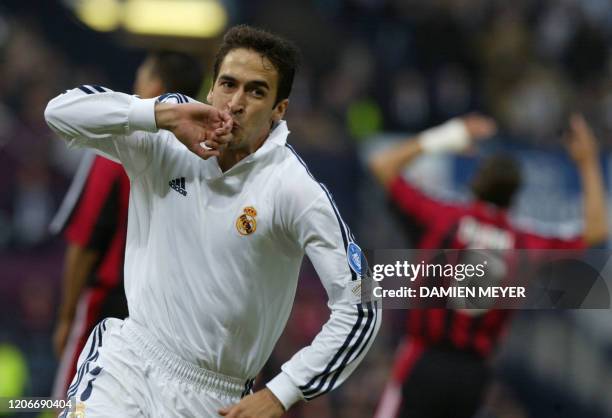 Real Madrid's forward Raul Gonzalez celebrates after scoring the first goal during the Champions League final opposing Real Madrid to Bayern...