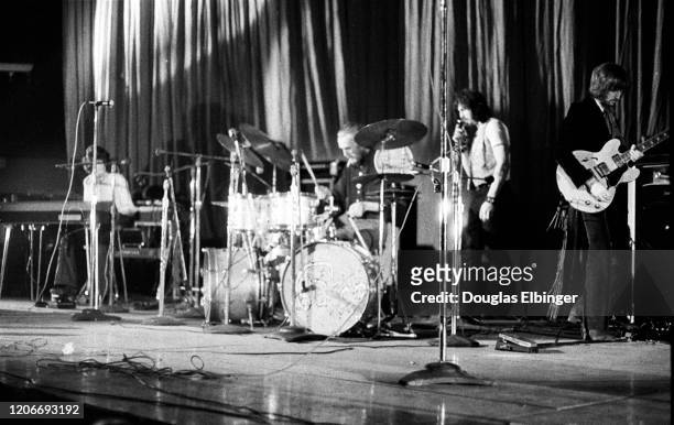 Members of English Rock group Blind Faith perform onstage at Olympia Stadium, Detroit, Michigan, August 1, 1969. Pictured are, from left, Steve...