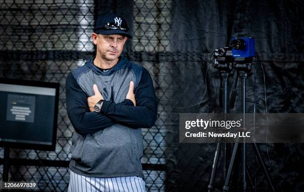 New York Yankees manager Aaron Boone stands with his arms crossed during spring training in Tampa, Florida on Feb. 13, 2020.