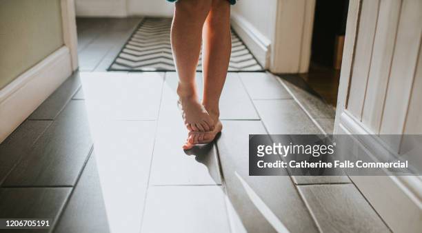 shy feet - human limb stock pictures, royalty-free photos & images