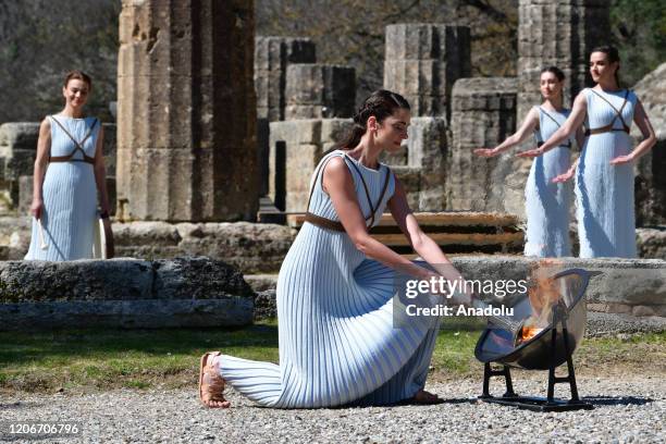 Greek actress Xanthi Georgiou in the role of the High Priestess lights the torch of the Olympic Flame during the Lighting Ceremonyâ of the Olympic...