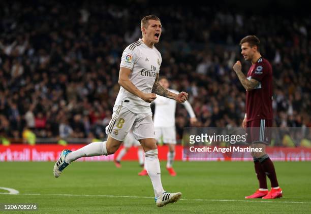 Toni Kroos of Real Madrid celebrates after scoring his team's first goal during the La Liga match between Real Madrid CF and RC Celta de Vigo at...
