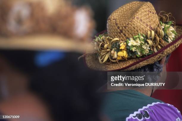 Marquisian mama wearing a traditional hat on Hiva Hoa island, Marquesas archipelago in French Polynesia.