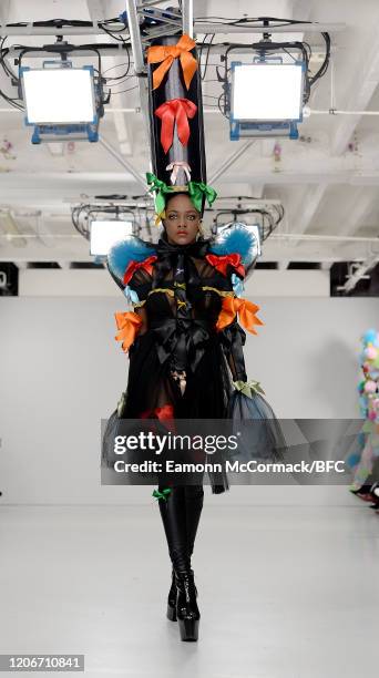 Model walks the runway at the Pam Hogg show during London Fashion Week February 2020 at the Fashion Scout Venue on February 16, 2020 in London,...