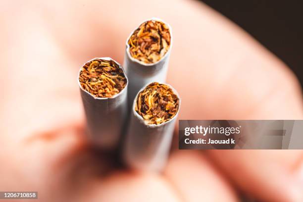 close up view of cigarettes - smoking issues stockfoto's en -beelden