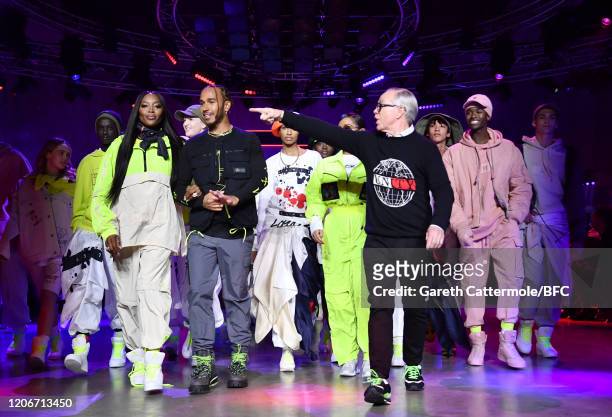 Naomi Campbell Lewis Hamilton and Tommy Hilfiger walk the runway with models at the TommyNow show during London Fashion Week February 2020 at the...