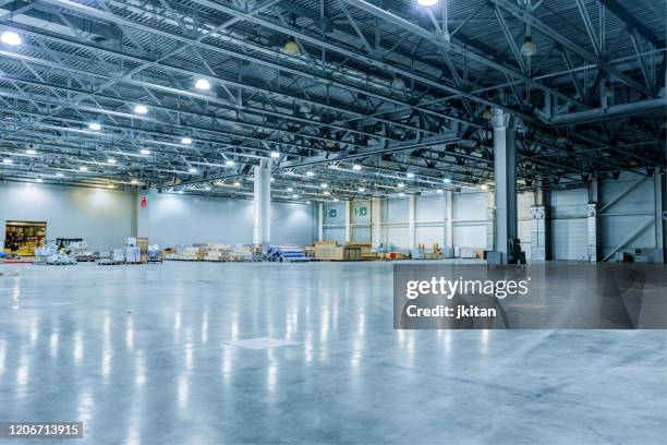 empty modern warehouse - industrial building stock pictures, royalty-free photos & images