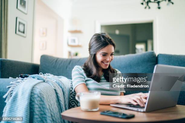 connect and relax at home - laptop imagens e fotografias de stock