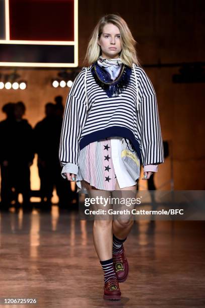 Lottie Moss walks the runway at the TommyNow show during London Fashion Week February 2020 at the Tate Modern on February 16, 2020 in London, England.