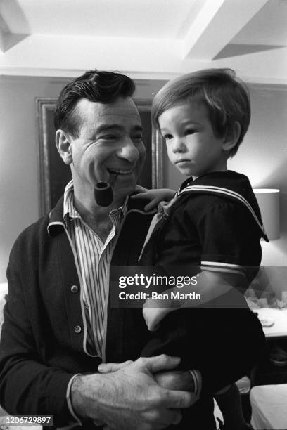 Walter Matthau , actor and comedian, at home with his son Charlie, 1965.