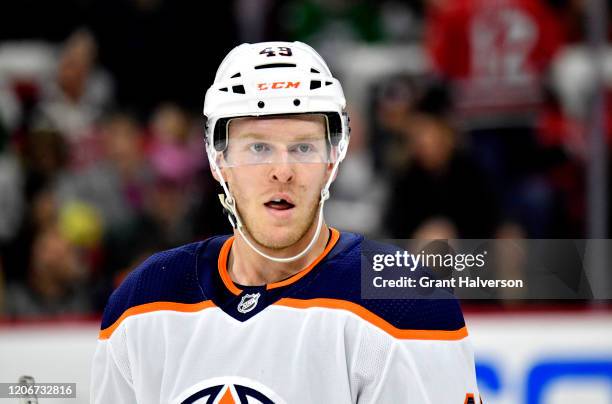 Tyler Benson of the Edmonton Oilers looks to the bench during the second period against the Carolina Hurricanes at PNC Arena on February 16, 2020 in...