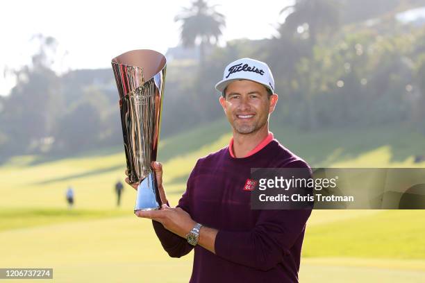 Adam Scott of Australia poses with the trophy after winning the Genesis Invitational on February 16, 2020 in Pacific Palisades, California.
