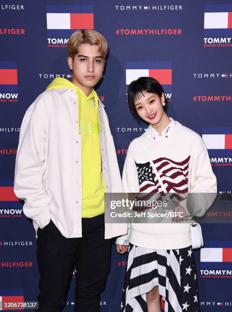 Kemio and Ayame Goriki attend the TommyNow show during London Fashion Week February 2020 at the Tate Modern on February 16, 2020 in London, England.