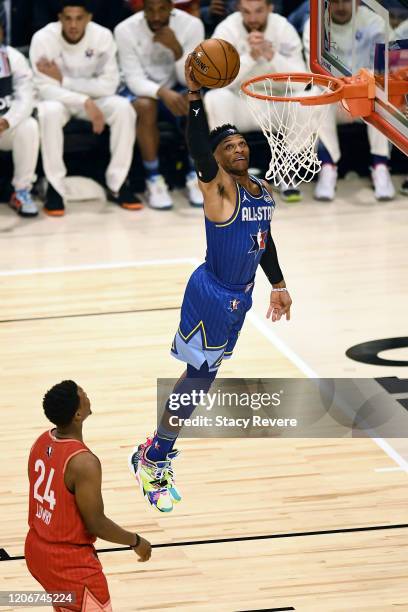 Russell Westbrook of Team LeBron dunks the ball over Kyle Lowry of Team Giannis in the first quarter during the 69th NBA All-Star Game at the United...