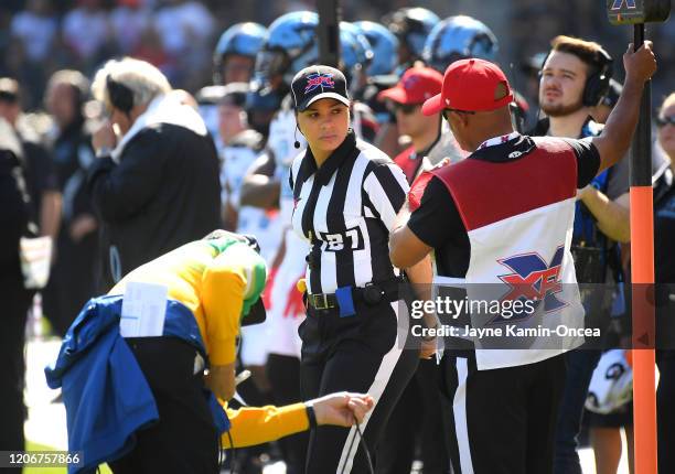 Line judge Maia Chaka stands on the field as she waits for play to resume during the game between the Los Angeles Wildcats and the Dallas Renegades...