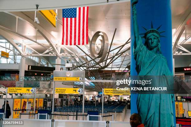 View of the Terminal 1 section is seen at John F. Kennedy International Airport on March 12, 2020 in New York City. - US President Donald Trump...