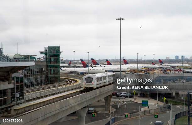 Delta planes sit on the tarmac at John F. Kennedy International Airport on March 12, 2020 in New York City. - US President Donald Trump announced a...