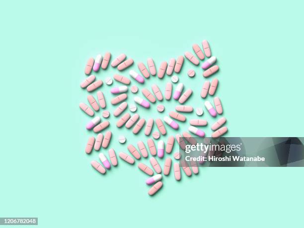 colon shaped with medication - constipation stock pictures, royalty-free photos & images