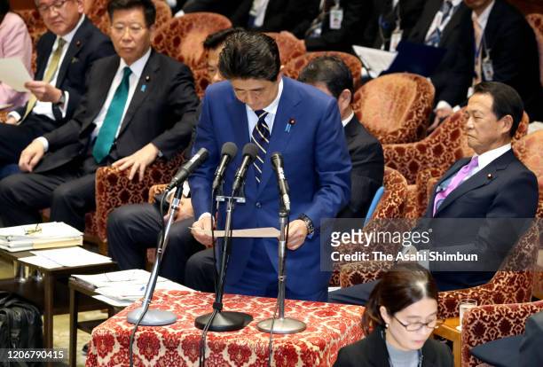 Prime Minister Shinzo Abe apologises at the beginning of the Lower House Budget Committee session on February 17, 2020 in Tokyo, Japan. "I apologize...