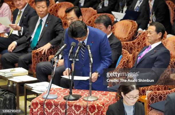 Prime Minister Shinzo Abe apologises at the beginning of the Lower House Budget Committee session on February 17, 2020 in Tokyo, Japan. "I apologize...