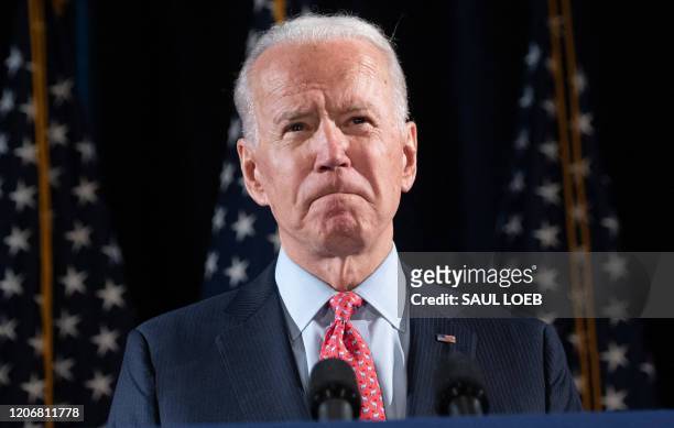 Former US Vice President and Democratic presidential hopeful Joe Biden speaks about COVID-19, known as the Coronavirus, during a press event in...