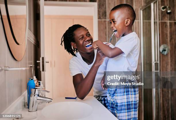 you caught on quite fast - brush teeth stock pictures, royalty-free photos & images