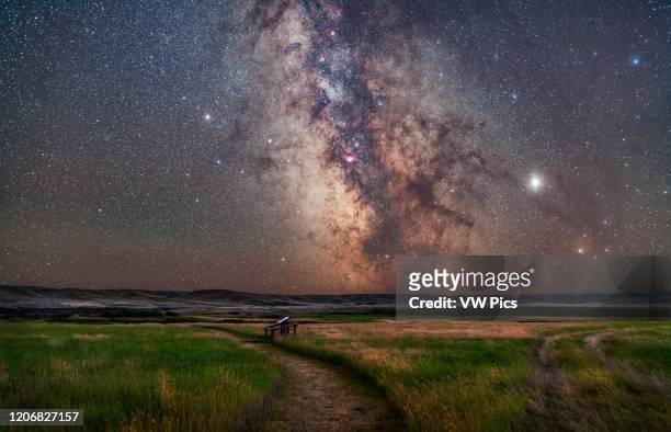 The core of the Milky Way in Sagittarius low in the south over the Frenchman River valley at Grasslands National Park, Saskatchewan. This is from the...