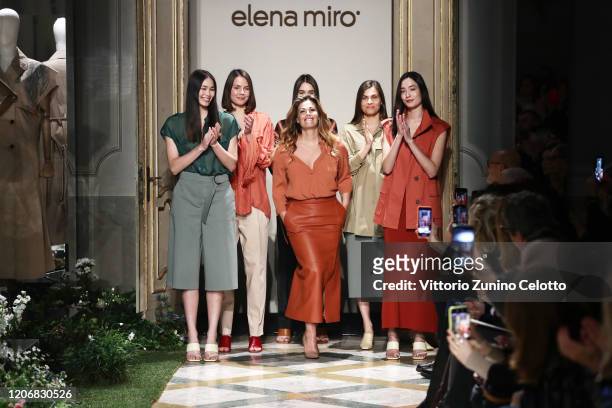Vanessa Incontrada acknowledges the applause of the public after the Elena Mirò Fashion Show on February 17, 2020 in Milan, Italy.