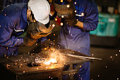 industry worker tig welding steel with safety mask for protect eyesight in metal factory.