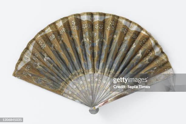 Folding fan with batiked leaf, on which a representation with 15 figures, on a mother-of-pearl frame inlaid with gold, Folding fan with batiked front...
