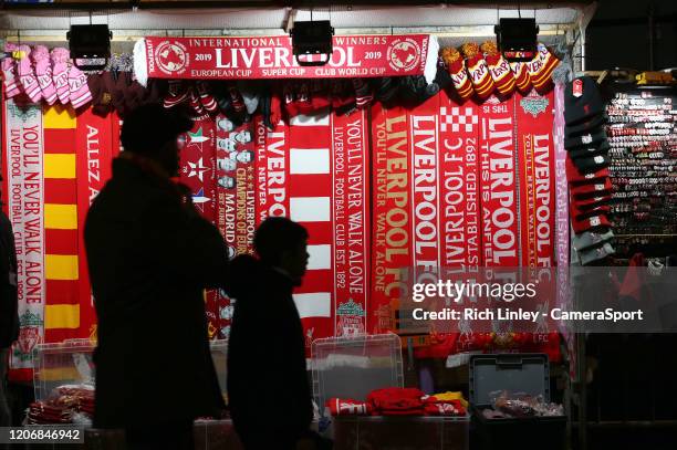 Scarves and memorabilia for sale outside Anfield ahead of the UEFA Champions League round of 16 second leg match between Liverpool FC and Atletico...