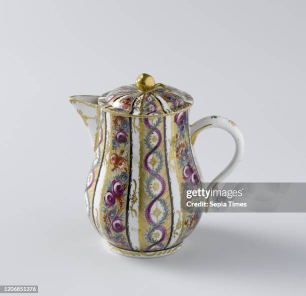 Milk jug with vertical borders, Milk jug with a pear shaped body, triangular spout from the rim and C -shaped ear, painted on the glaze in blue, red,...